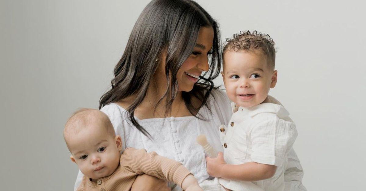 Layla Taylor holds her two sons in a family photo.