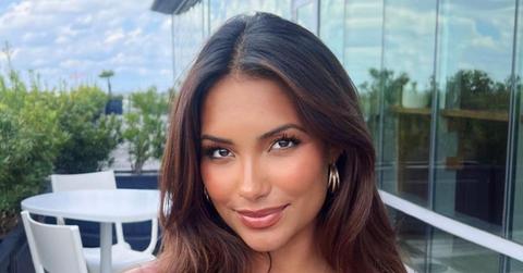 Mia Alario smiling outside on a patio