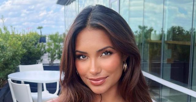 Mia Alario smiling outside on a patio