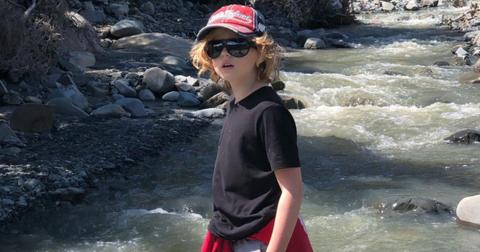 Christian Convery enjoying a stream in New Zealand while filming 'Sweet Tooth'.