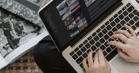 Someone typing on a laptop