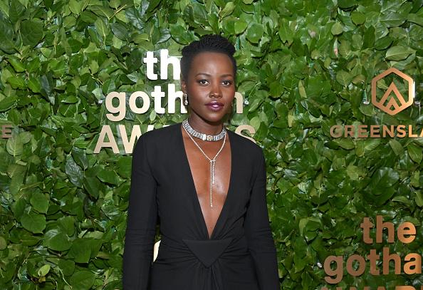 Lupita Nyong'o poses in the GreenSlate Greenroom