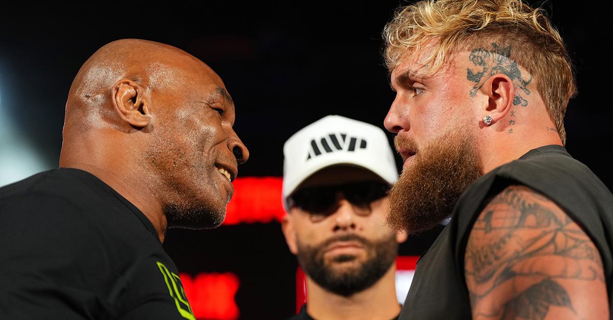 Mike Tyson and Jake Paul facing off ahead of their boxing match. 