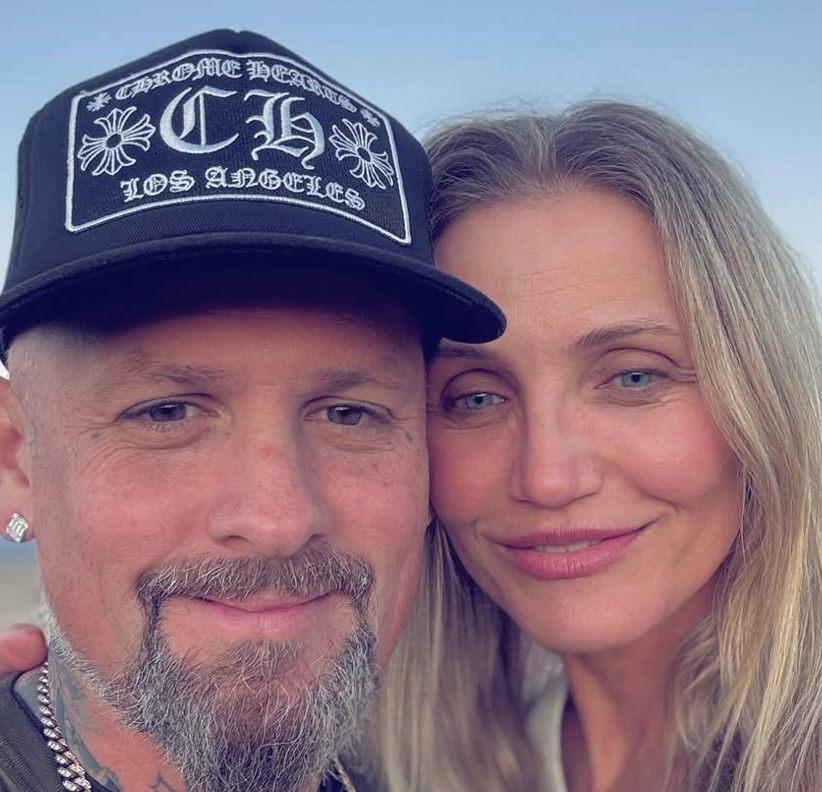 Cameron Diaz with her husband, Benji Madden outside.