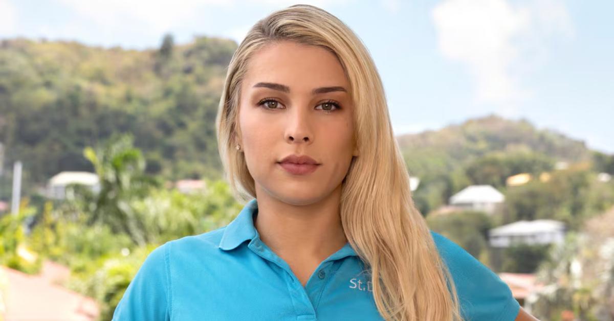 Paris Field dons a blue 'St. David' polo for her official 'Below Deck' press portrait.