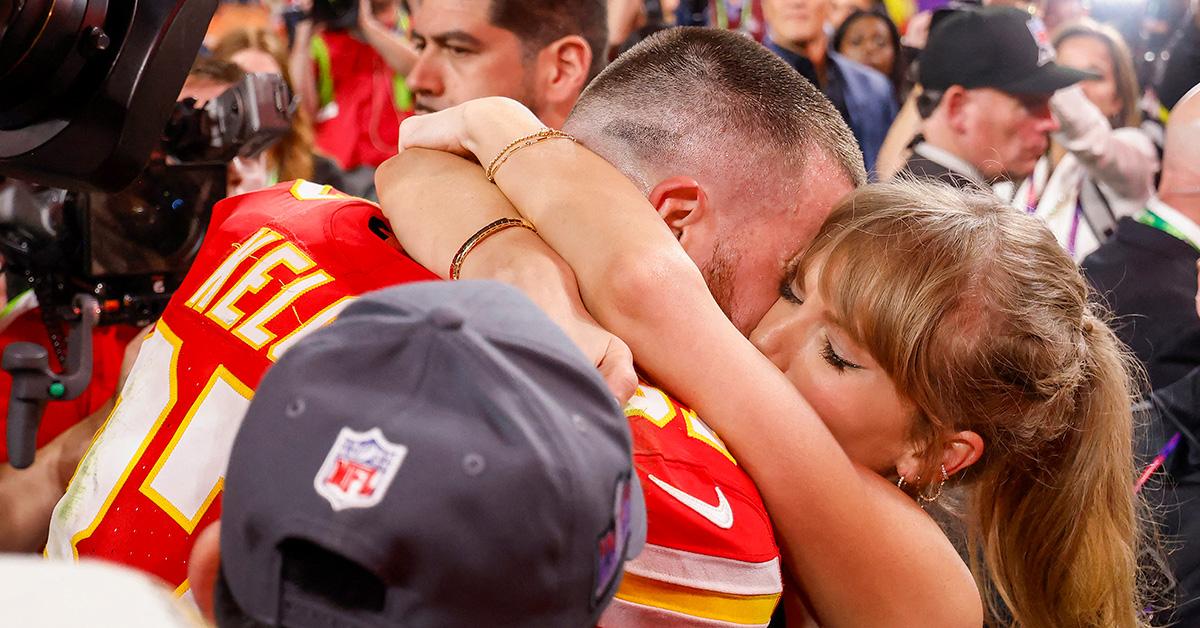 Taylor Swift and Travis Kelce hugging after the Super Bowl. 