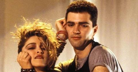 Madonna and Christopher with their heads in their hands.