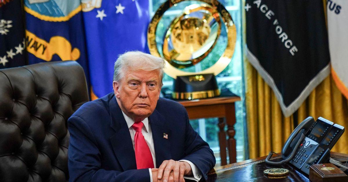 Donald Trump sitting in the Oval Office. 