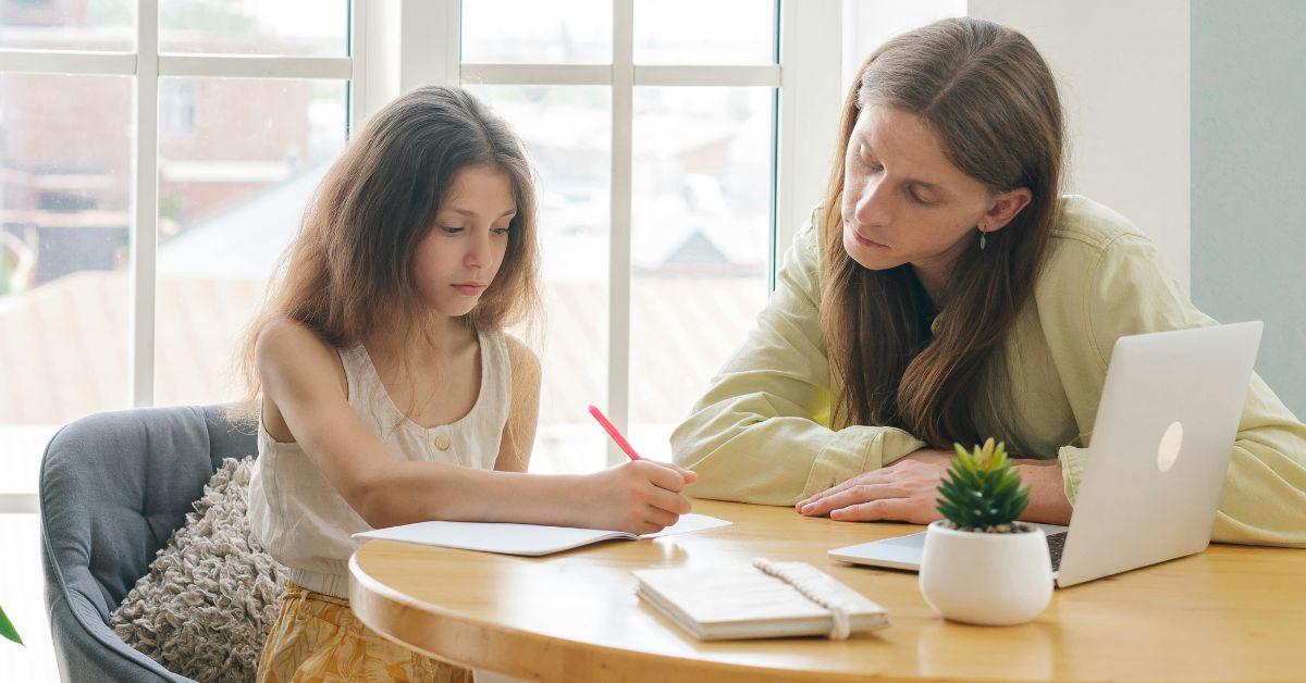 A Parent Helping Their Child With Homework