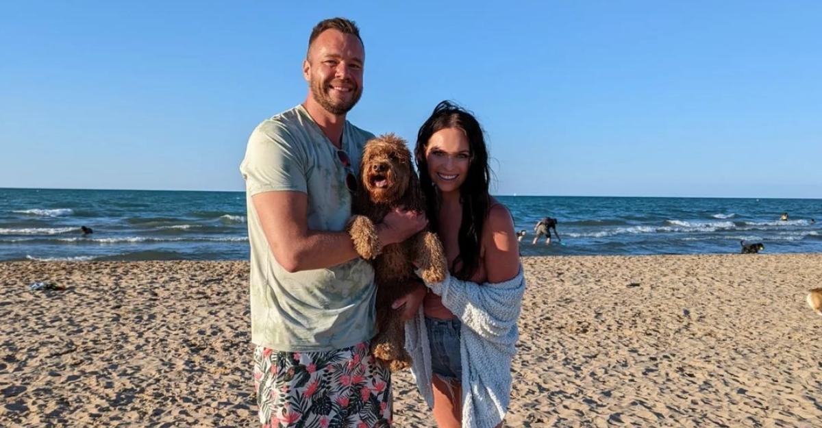 'Love Is Blind's Nick and Danielle on a beach with Nick's dog