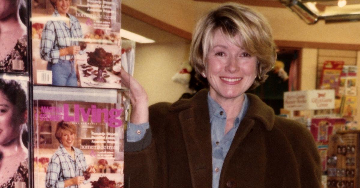 Martha Stewart stands by copies of her magazine