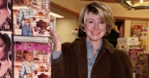 Martha Stewart stands by copies of her magazine