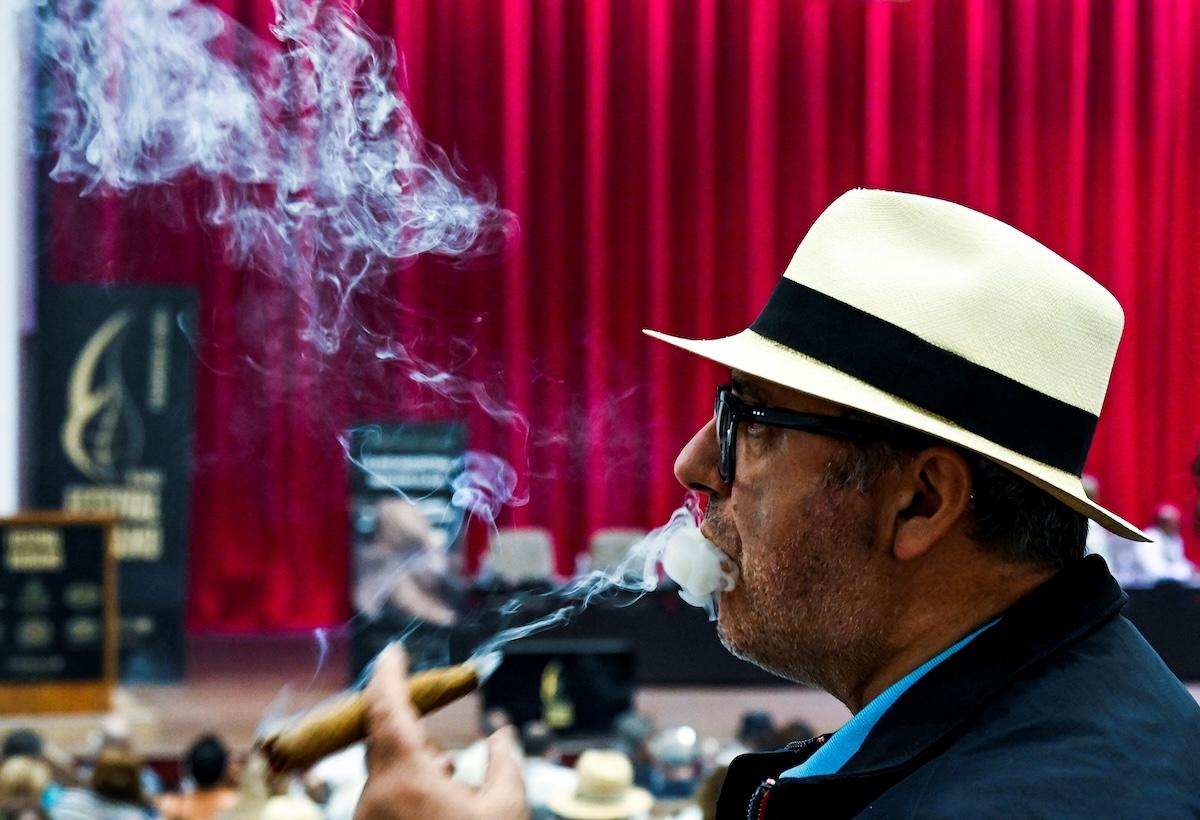 Man smoking a Cuban cigar at Cuban Habano Festival
