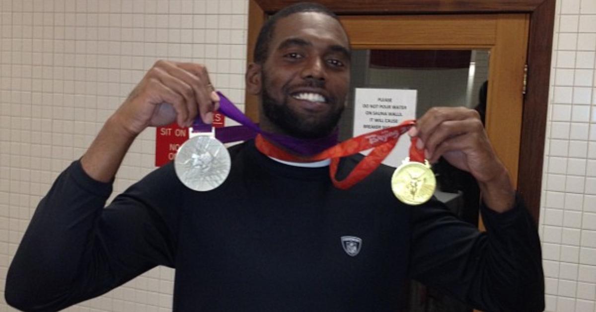 Randy Moss wearing medals