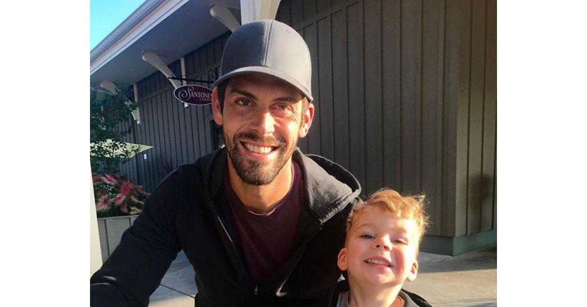 Justin Tucker with his son outside. 