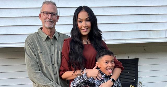 Mila de Jesus with her husband and son