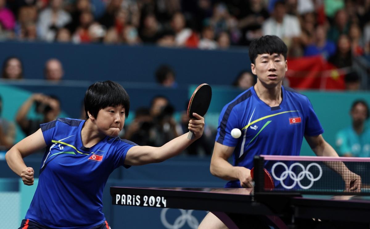 North Korea athletes play table tennis at the Olympics