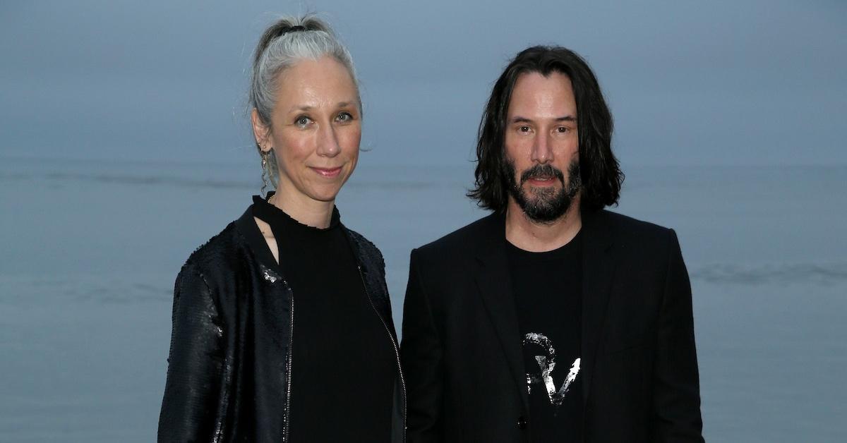 Alexandra Grant and Keanu Reeves attend the Saint Laurent Mens Spring Summer 20 Show