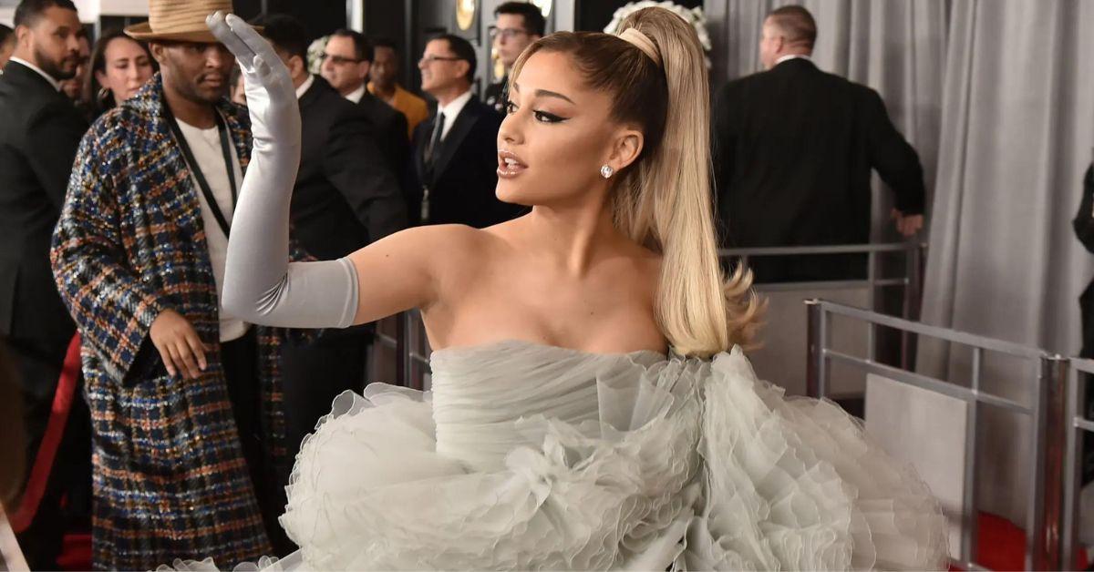 Ariana Grande attends the Grammys in a beautiful silver dress