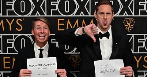 Alexander Skarsgard (R) and US actor Jack McBrayer arrive for the 75th Emmy Awards at the Peacock Theatre at L.A. Live in Los Angeles on January 15, 2024