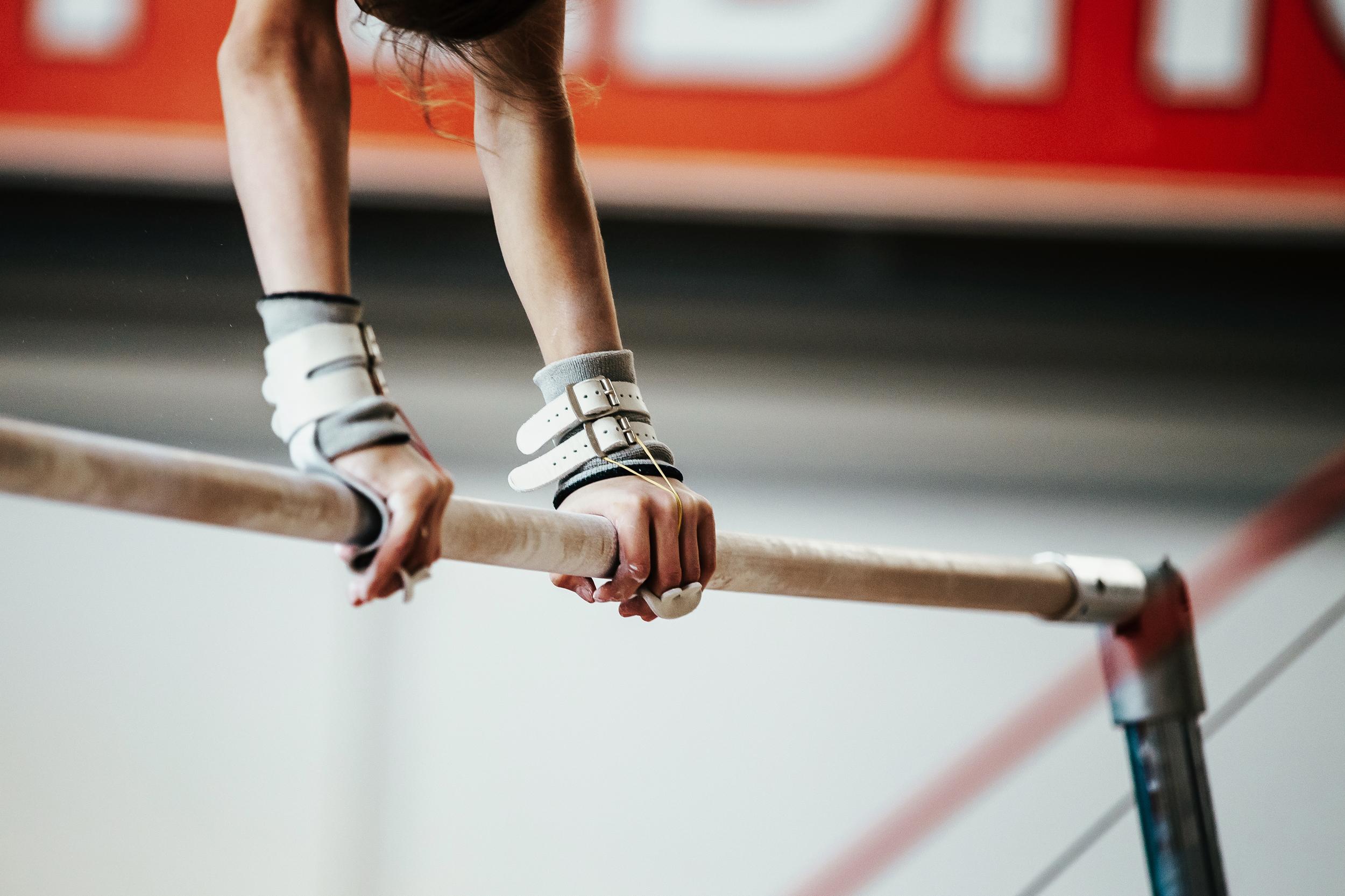 Why Do Gymnasts Spray the Uneven Bars? The Answer Might Surprise You