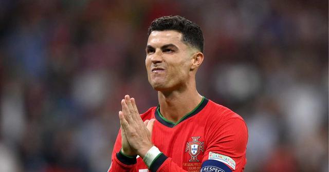 Cristiano Ronaldo of Portugal celebrates scoring the team's first penalty in the penalty shoot out during the UEFA EURO 2024 round of 16 match