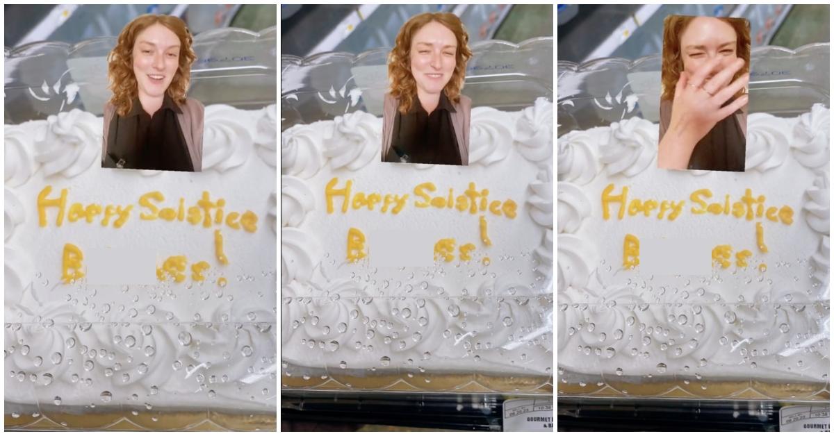 Woman shows off summer solstice cake faile fail at Fred Meyers