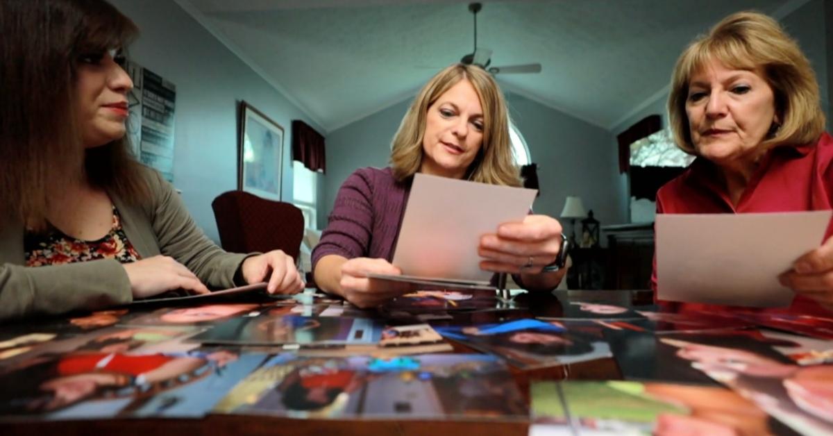 Bethany Decker's family looks at photos of her