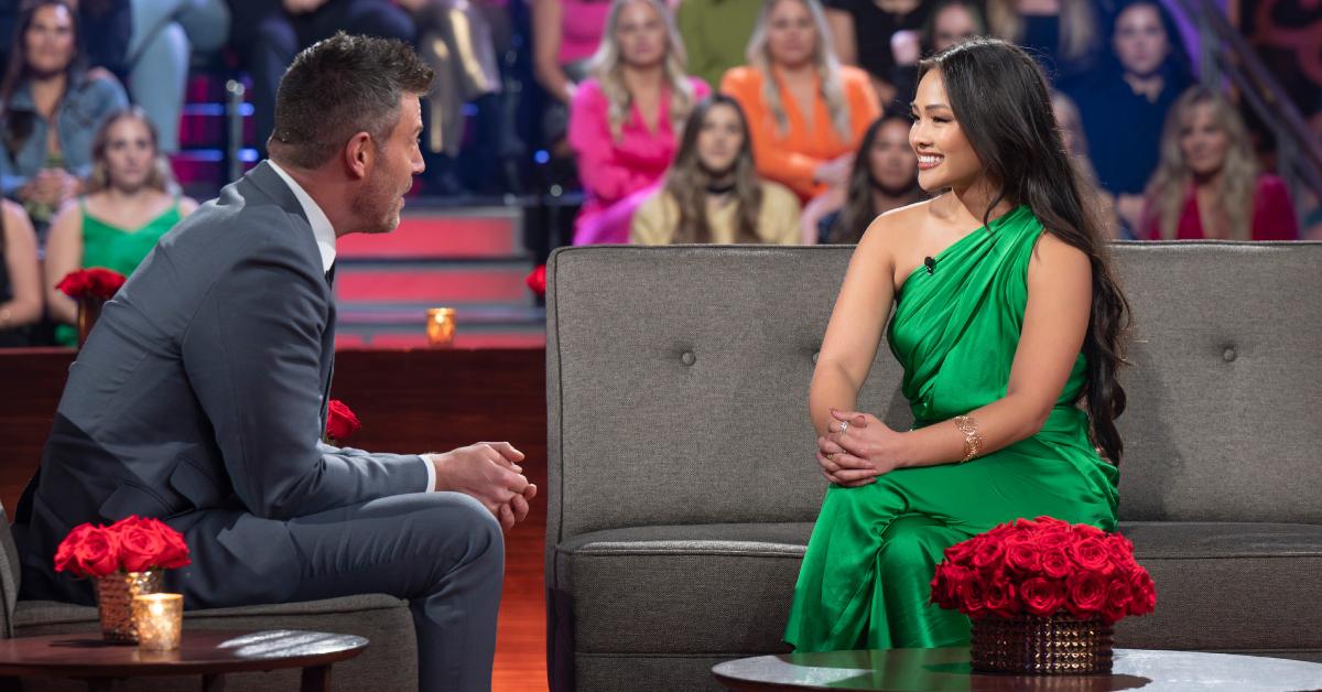 Jenn Palmer dons a gray suit as he speaks with Jenn Tran, who flaunts a one-shoulder green satin gown, during the "Women Tell All" special.