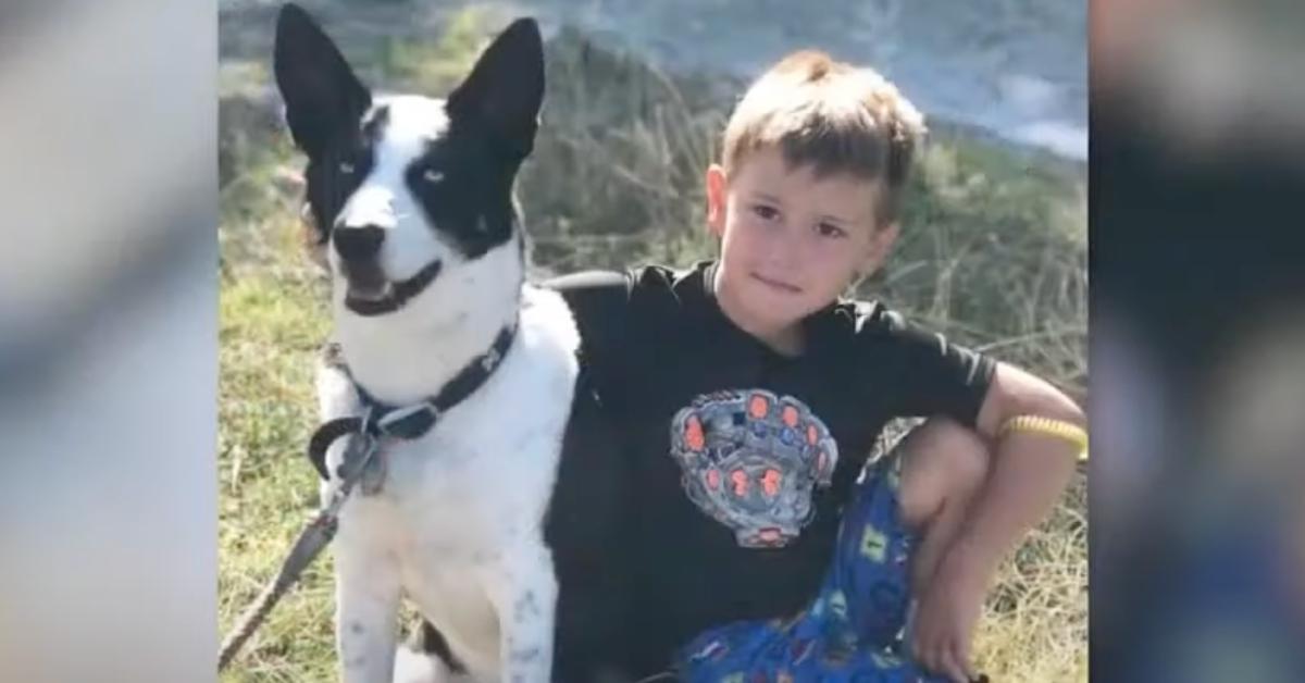 Corey Micciolo poses with a dog