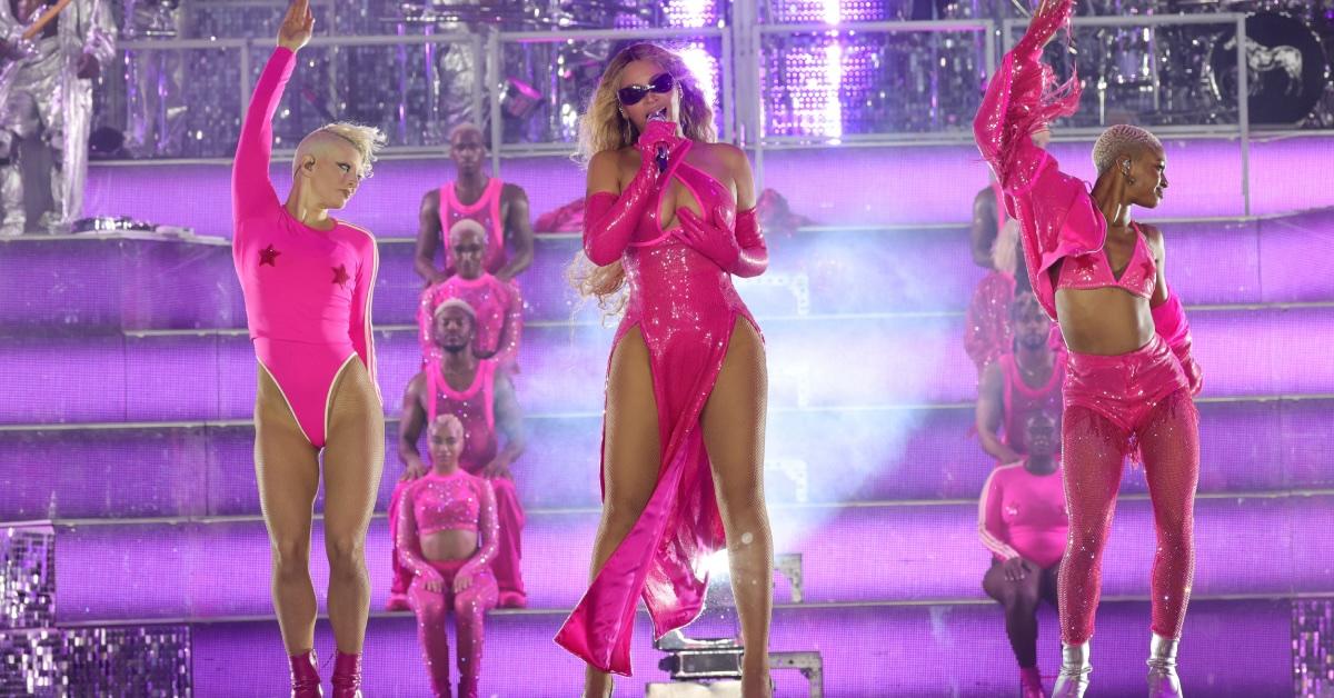 Beyoncé rocks a racy bubblegum-pink thigh-slit dress during her Renaissance Tour stop in Amsterdam.