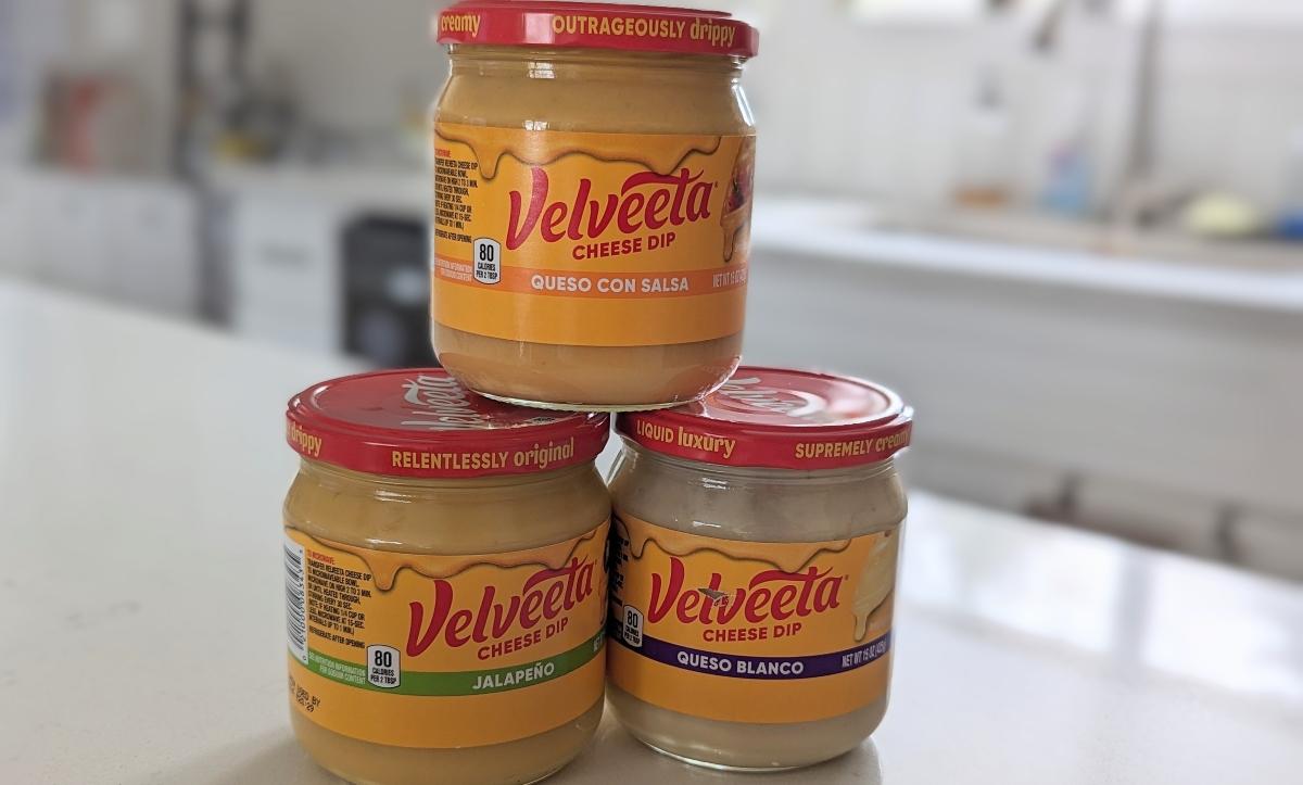 Velveeta Queso jars on a kitchen counter