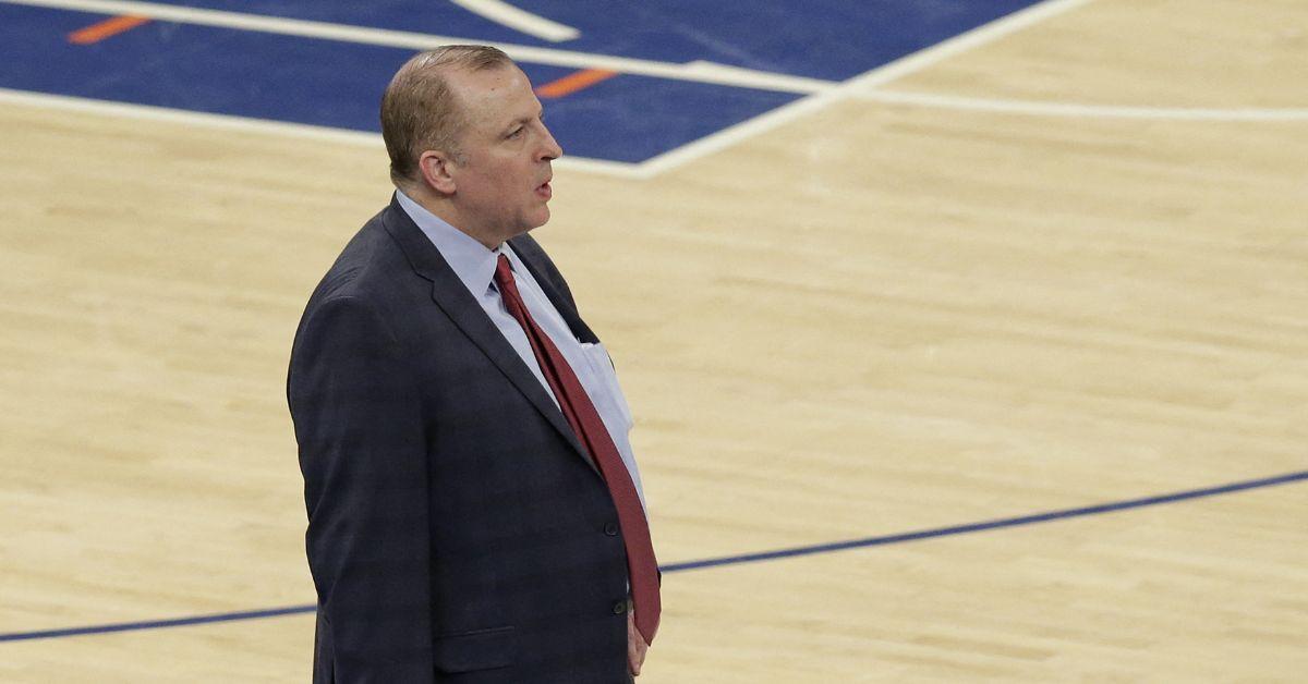 Tom Thibodeau coaching in a suit and tie in 2016. 