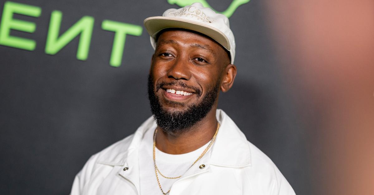 Lamorne Morris poses on the red carpet at the FENTY x PUMA sneaker launch party on Dec. 18, 2023, in Hollywood.