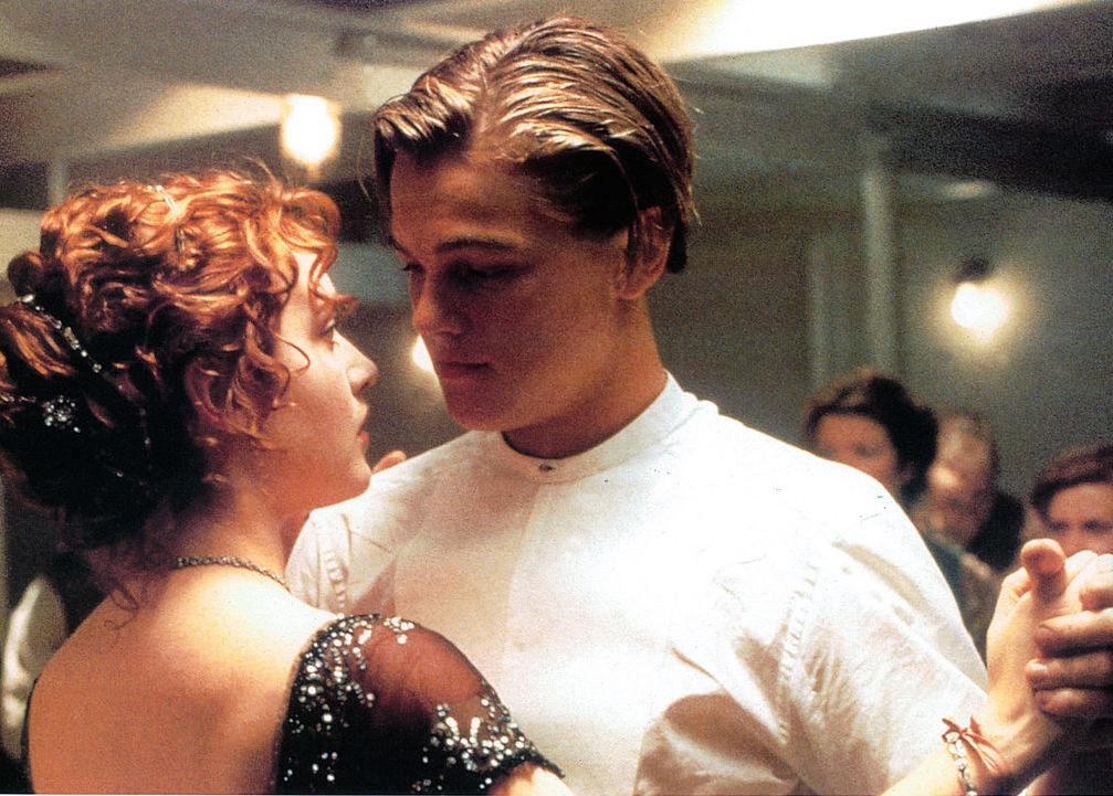 Kate Winslet and Leonardo DiCaprio dancing in a scene from the film 'Titanic', 1997