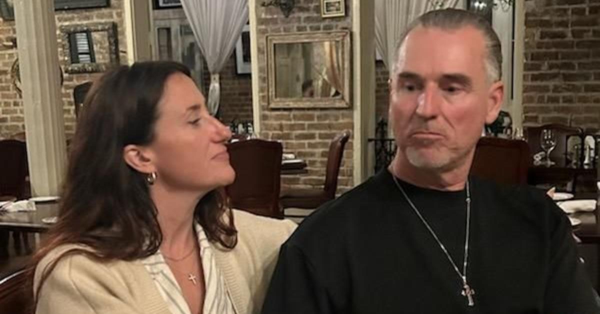 Coach with his wife Jessica at a restaurant.
