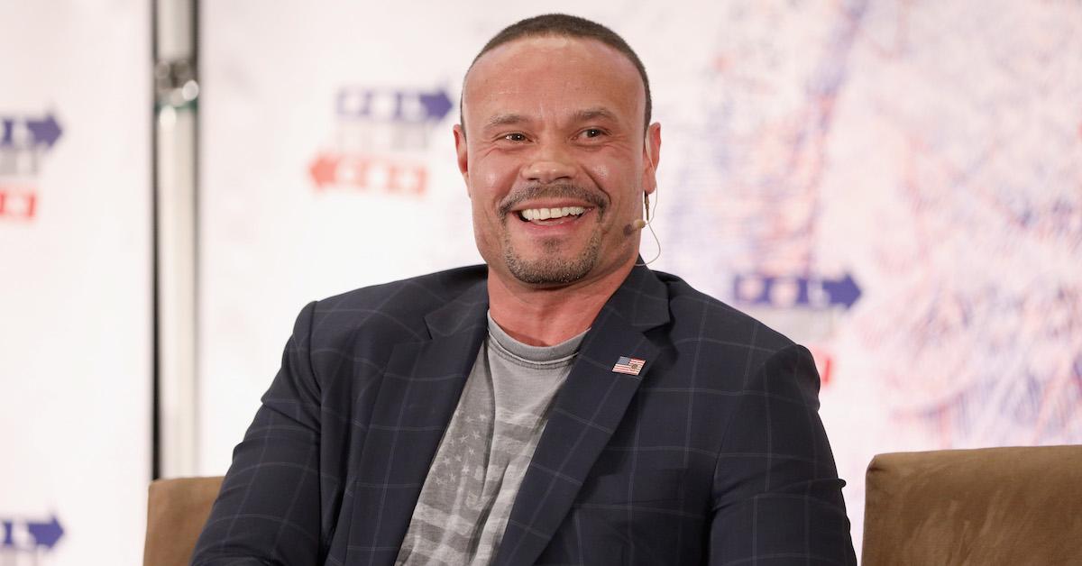 Dan Bongino smiling during interview