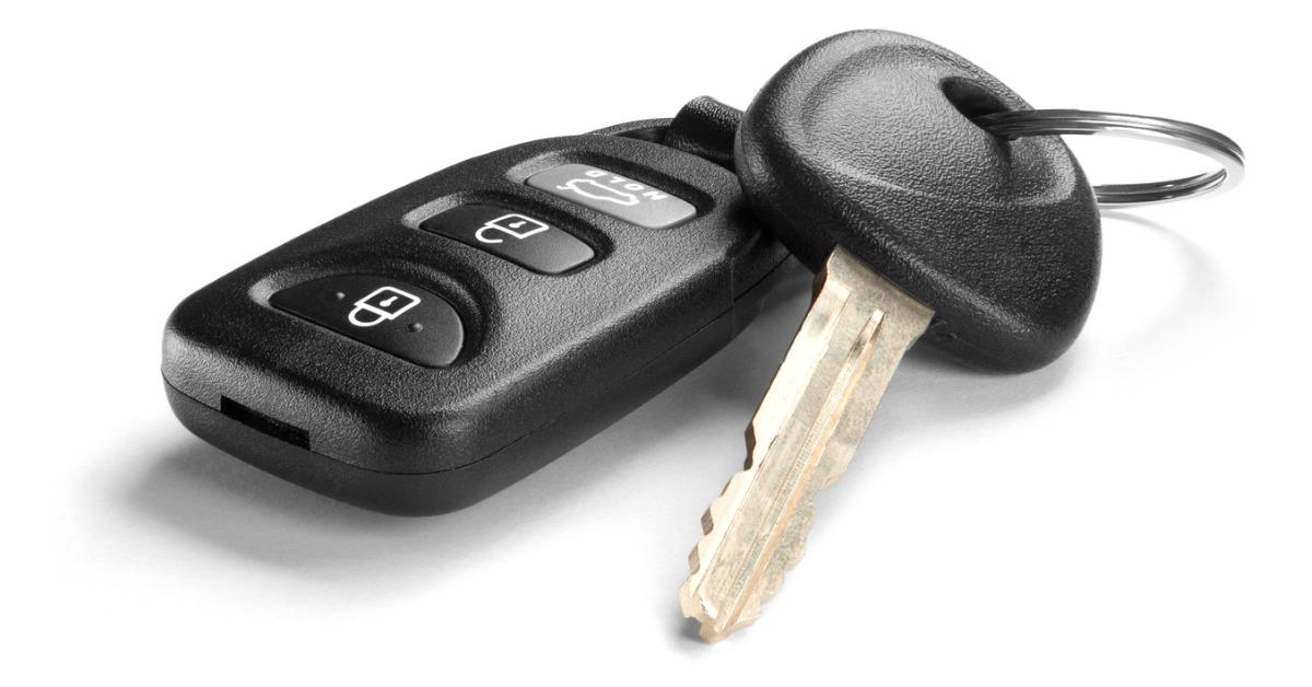 black car key and remote on white background picture id