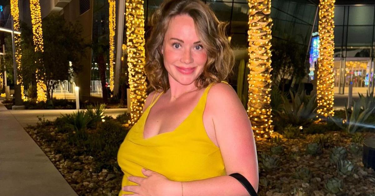 Whitney Leavitt in a yellow dress