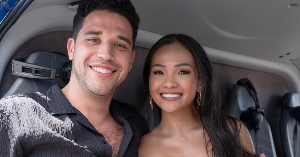 Devin Strader and Jenn Tran in a helicopter together