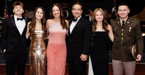 Brooke Rollins (C) with her husband and children