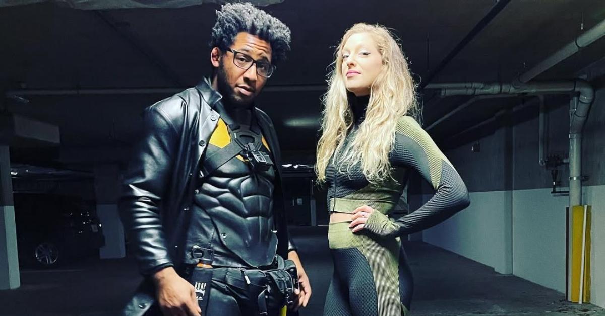 (l-r): Phoenix Jones and a woman in uniform