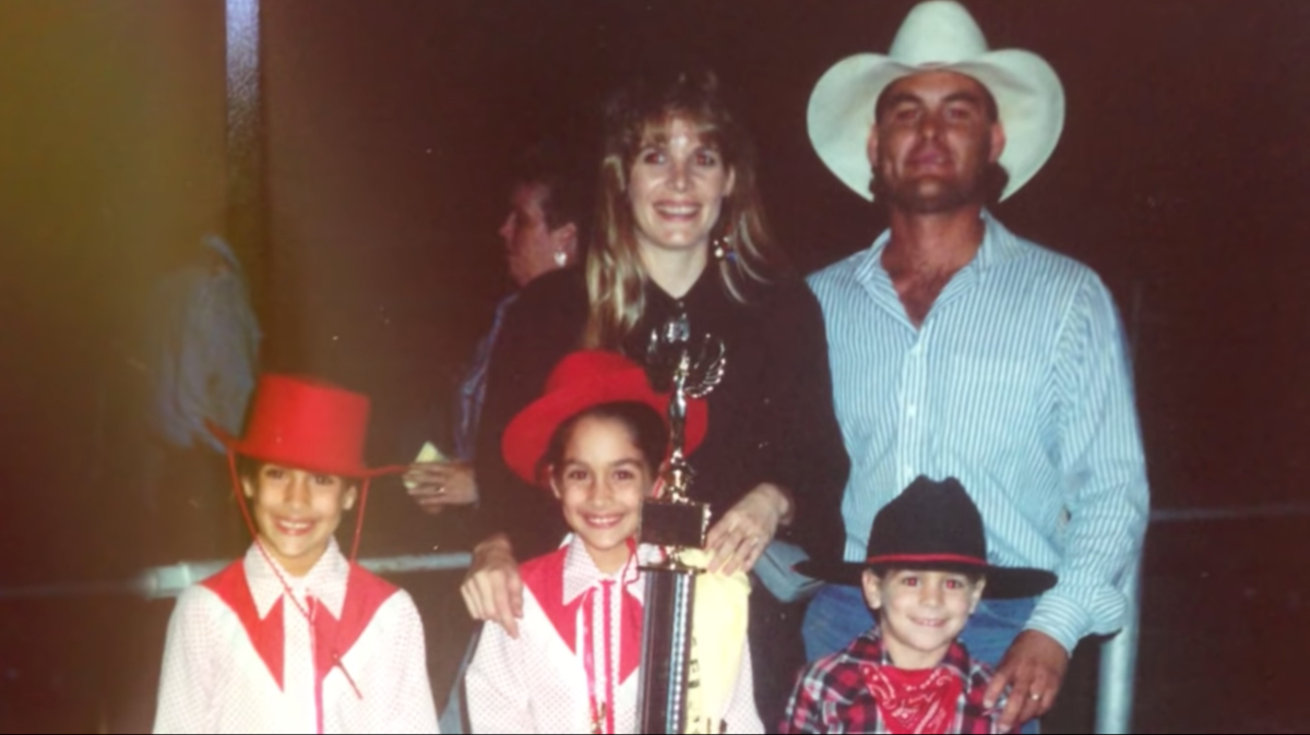 The Bella twins and their biological father, mother, and brother