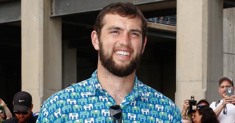 Andrew Luck wearing an elephant short sleeve shirt.