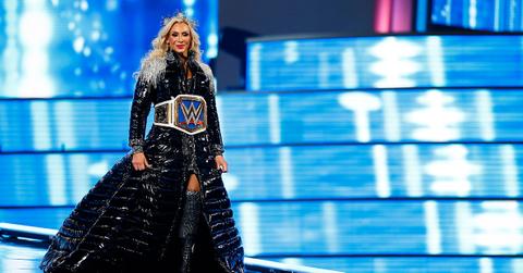 Charlotte Flair wearing her belt during Wrestlemania 39.