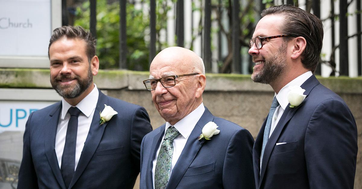 James, Rupert, and Lachlan Murdoch in suits.