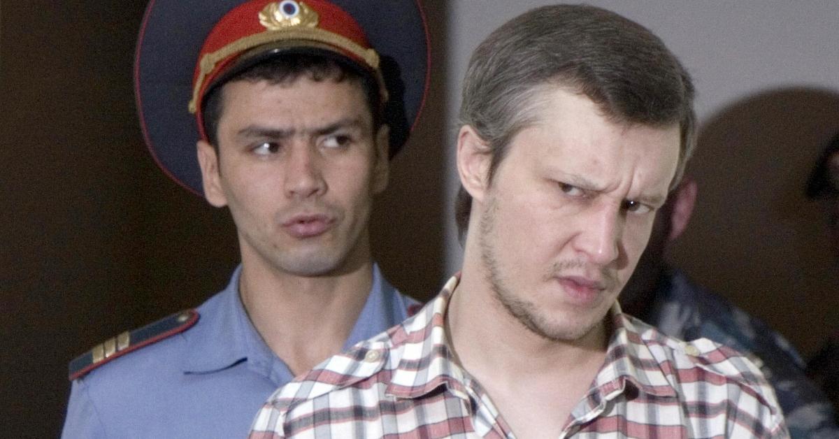 Alexander Pichushkin is escorted into the courtroom of the Moscow City Court in Moscow, Aug.13, 2007.